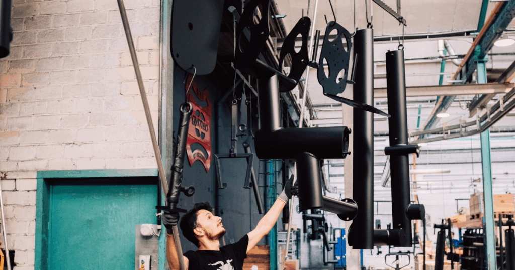 The assembly and inspection of Gym80 equipment parts guarantee precision and reliability in every machine.