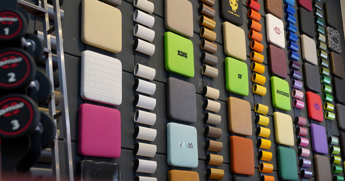 Customizable upholstery and frame color options from Gym80, engineered to follow ergonomic curves and enhance personalized gym design.