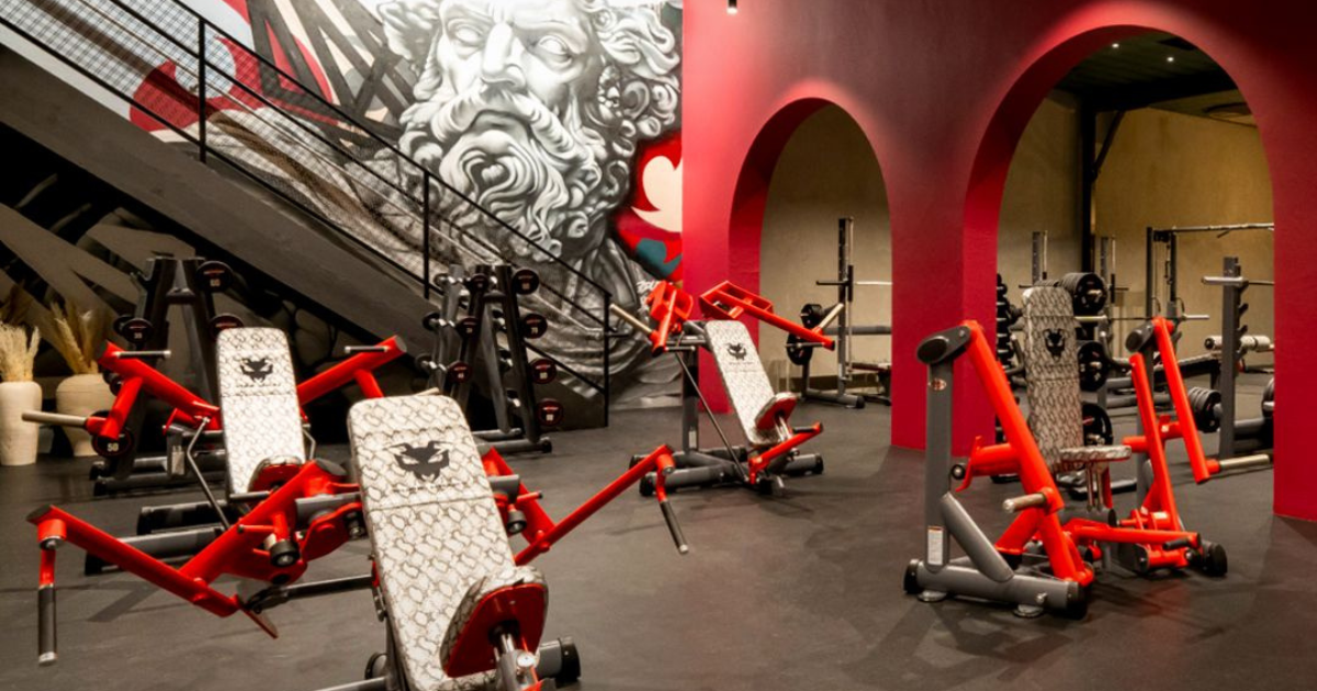 State-of-the-art Gym80 training facility featuring German-engineered strength machines, custom design benches, and performance-focused equipment.