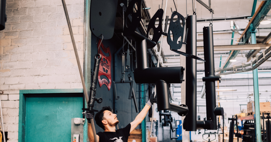 gym80 strength equipment components in production for German-made commercial gym machines